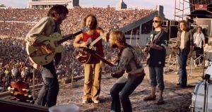 Drummond (center) performing with Crosby, Stills & Nash