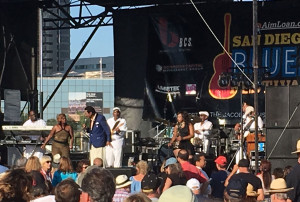 Bobby Rush trades vocals with his backup singers on the Business Complete Solutions Stage